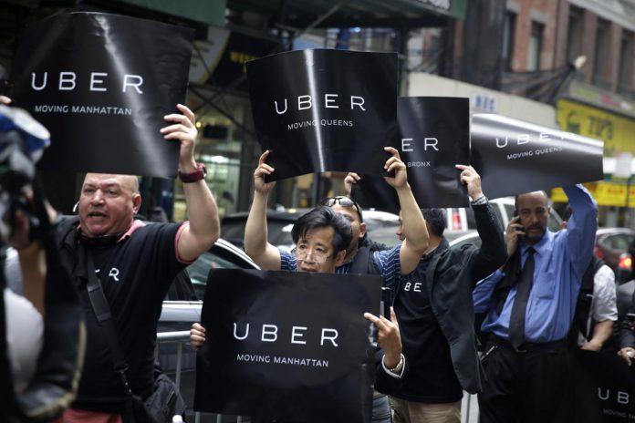 London tribunal rules Uber drivers deserve workers' rights
