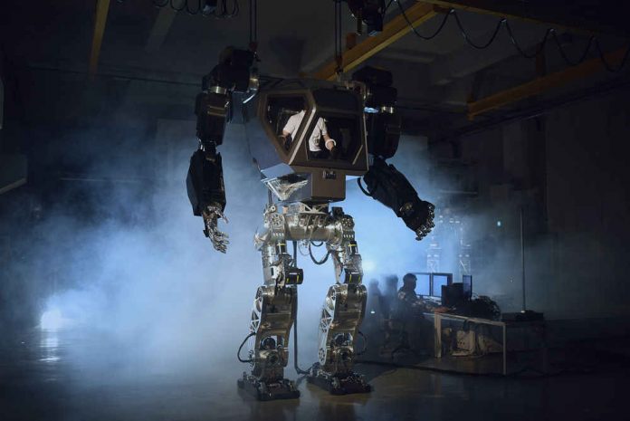 13ft tall manned robot learns to walk and move hands (Watch)