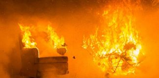 Staged Christmas tree fire to promote holiday safety Staged Christmas tree fire to promote holiday safety