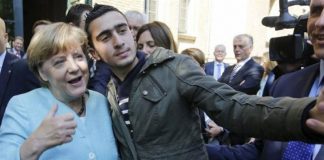 Facebook wins case against Syrian refugee Anas Modaman in Merkel selfie Facebook wins case against Syrian refugee Anas Modaman in Merkel selfie