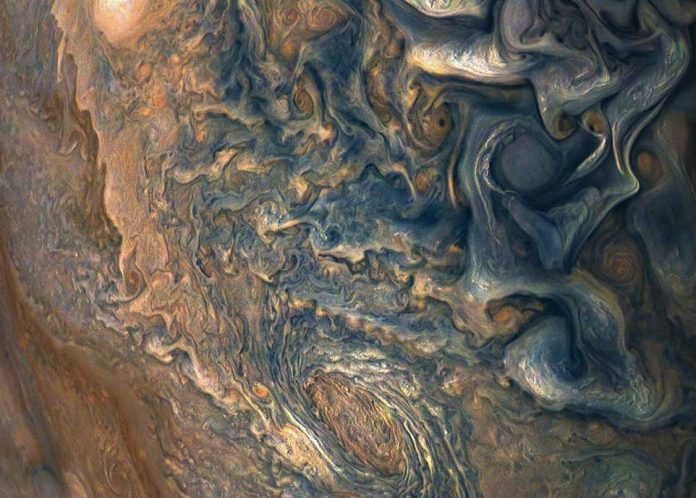 Watch: Nasa captures turbulent Jovian clouds in stunning new photo