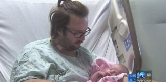 John Lancaster wakes up from coma to meet his firstborn baby John Lancaster wakes up from coma to meet his firstborn baby