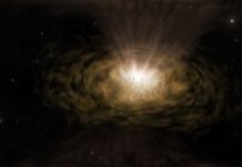 Research: Mysterious features seen in light emitted from active galactic nuclei may be due to partial obscuration by dust clouds —
