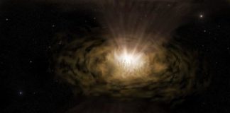 Research: Mysterious features seen in light emitted from active galactic nuclei may be due to partial obscuration by dust clouds —