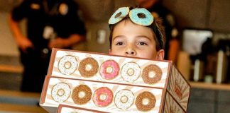 Tyler Carach delivers donuts to police officers across America Tyler Carach delivers donuts to police officers across America