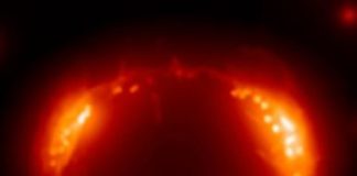 Tech: How hot are atoms in the shock wave of an exploding star? New study of nearby supernova SN1987A answers longstanding debate — (Report)