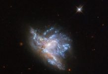 Tech: Hubble’s dazzling display of 2 colliding galaxies — (Report)