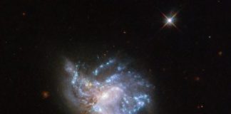 Tech: Hubble’s dazzling display of 2 colliding galaxies — (Report)