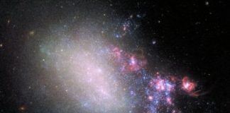 Research: Galaxy blazes with new stars born from close encounter —