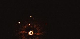 Scientists Unveil First Photo of Sun-Like Star Orbited by Pair of Exoplanets Scientists Unveil First Photo of Sun-Like Star Orbited by Pair of Exoplanets