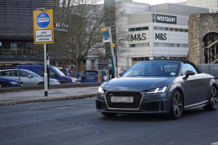 Violation: Cars Spotted Driving in New City Centre Bus Route - Sparking Anger Over Signs